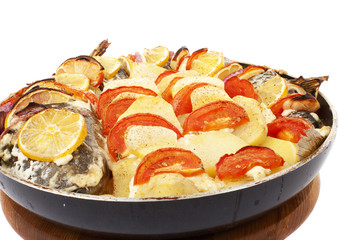 Haarder stuffed baked with potatoes and tomatoes