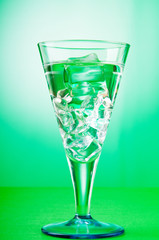 Water in the glass against gradient background