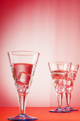 Water in the glass against gradient background