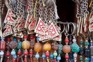 Deurstickers Close up of a selection of souvenirs, Kathmandu, Nepal © pawelkowalczyk