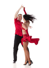 Dancing young couple. - obrazy, fototapety, plakaty