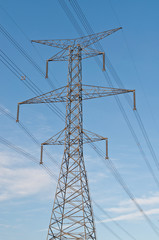 Electrical Power Transmission Tower with Blue Sky