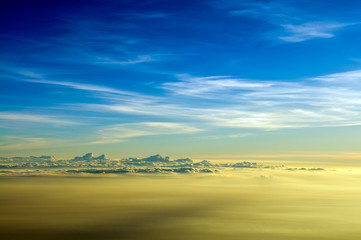 Fototapeta na wymiar airplane view dawn cloudscape