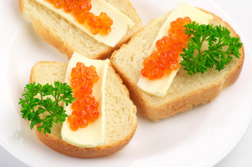 Canapes with salmon caviar