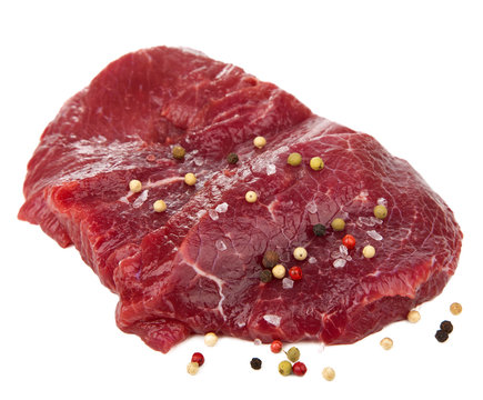 raw beef with spices isolated