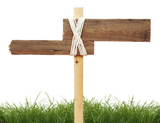 road sign with green grass isolated on a white background