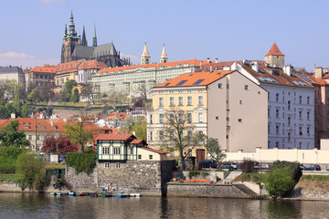 Obraz premium View on the spring Prague gothic Castle above River Vltava