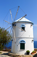 Fototapeta na wymiar Traditional windmill at Zakynthos island in Greece