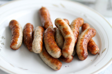white sausages on plate