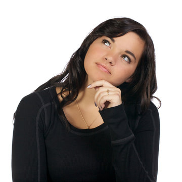 Young woman looking up in contemplation