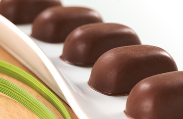 Chocolate candies filled with pecan nut