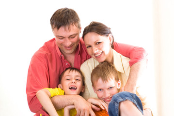 Fototapeta na wymiar happy parents with their children