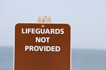 Lifeguards not provided sign