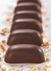 Chocolate candies filled with pecan nut