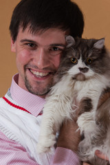 young man with cat