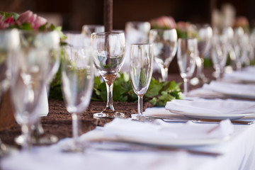 Wine and champagne glasses on table. Selective focus