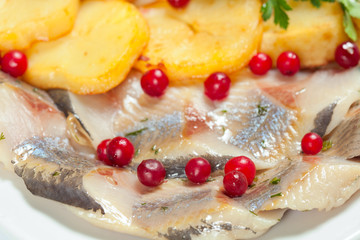 Herring with potatoes and vegetable