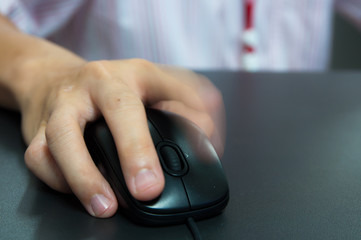 hand holding computer mouse