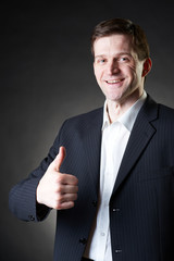 Elegant handsome young man, studio portrait