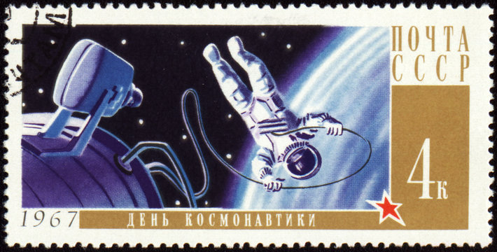 Postage stamp with Cosmonaut in open space