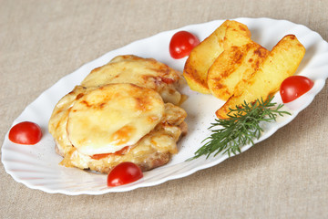 Meat in French with fried potatoes