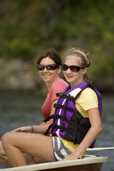 Women In Boat, Lake Of The Woods, Ontario, Canada