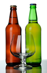 Two bottles of beer and glass, isolated