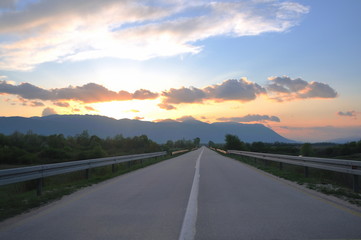 countryroad adventure with beautiful sunset