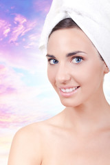 smiling female with towel