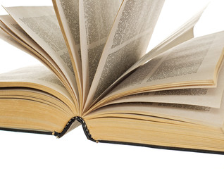 old opened book isolated on the white background