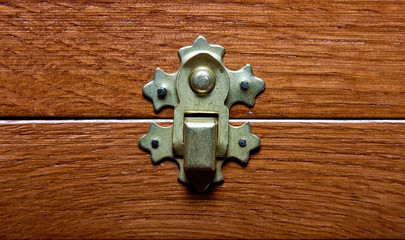 lock of a wooden casket close up
