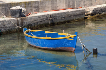 Boat moored at  Molfetta port. Apulia.
