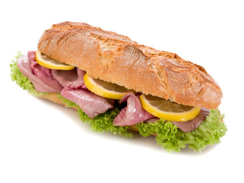 sandwich with roastbeef lettuce and slice lemon