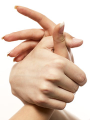 Female and man's hand on a white background
