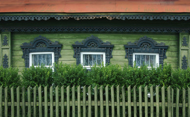 windows of a old russian house with decorative carvings