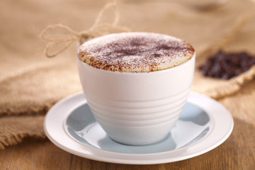 hot frothy drink cappuccino coffee, rustic style, shallow dof