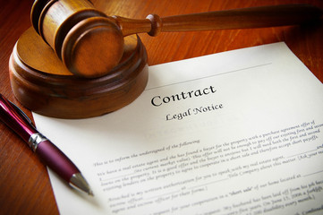 legal gavel and a business contract