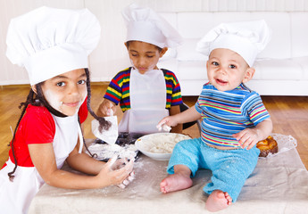Kids playing with flour