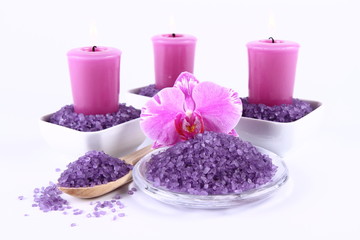 Lavender spa salt, candles and an orchid flower