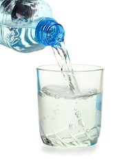 bottle and glass of water isolated on white