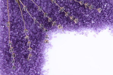 Lavender spa salt and lavender flowers background