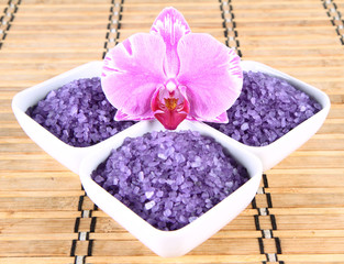 Lavender spa salt and an orchid flower