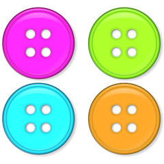 set of glossy pink green blue and orange buttons