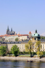 Fototapeta premium View on the spring Prague gothic Castle above River Vltava
