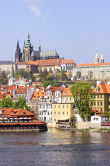 Obraz premium View on the spring Prague gothic Castle above River Vltava