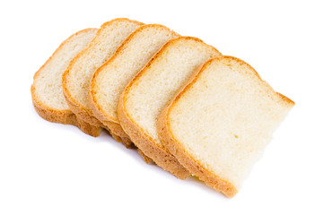 Fresh hot slices of home-made bread isolated on a white