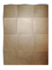 Folded old brown paper on white