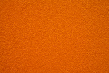 The cement walls painted orange.