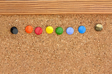 drawing pins in a cork pinboard