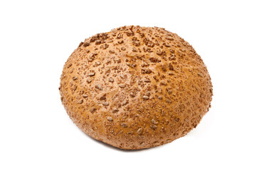 Brown coarse grinding round bread  with sunflower seeds